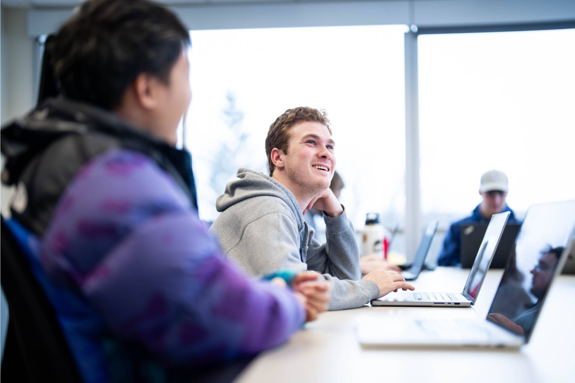 Computer Science major Jagger Denhof smiles during a computer research group meeting November 28 in Mackinac Hall.